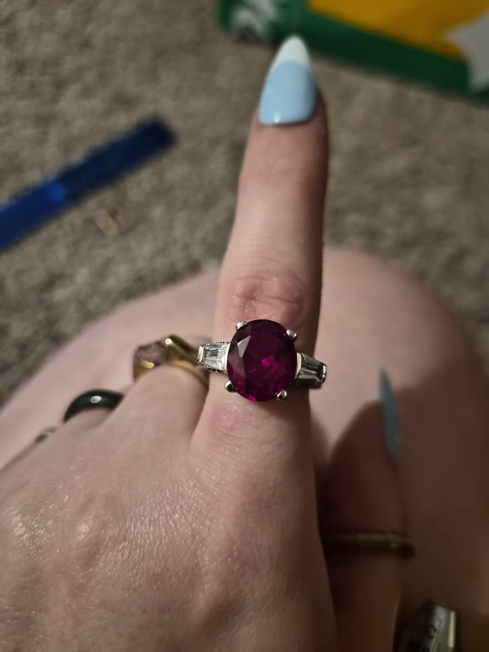 Ruby Red Oval Solitaire Ring with Baguette Accents